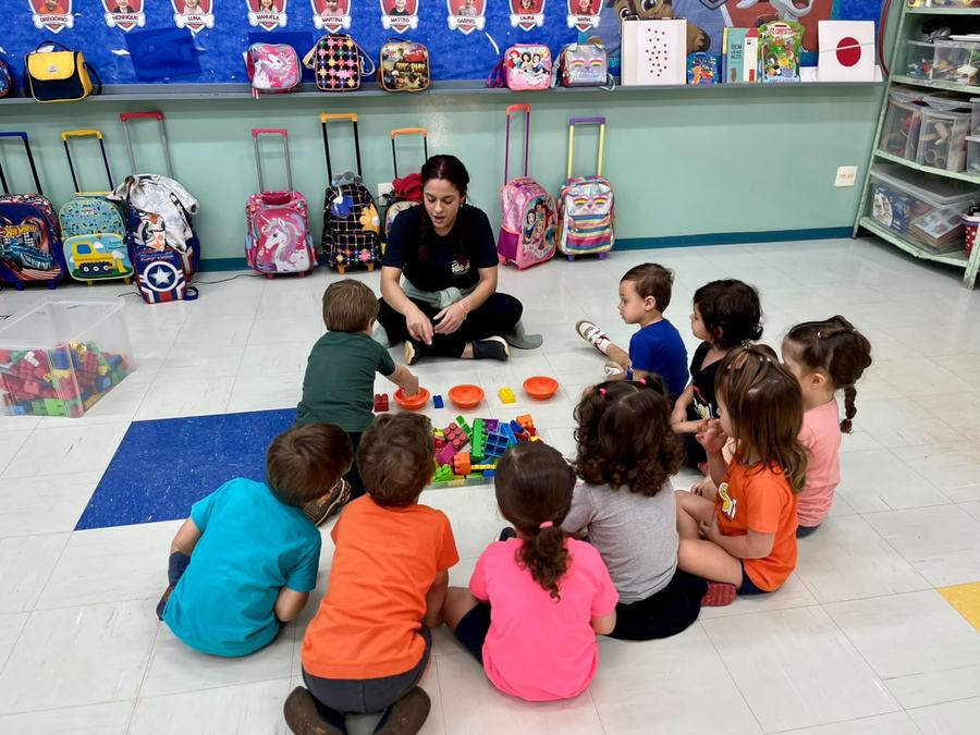 Circle time with toddlers sorting blocks by color
